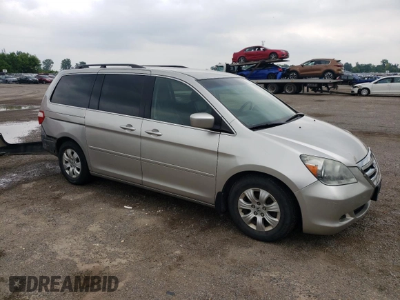 2007 Honda Odyssey EX with VIN 5FNRL38427B513477, listed as a Copart auction lot 62457695 with 216,977 mi miles and Salvage title. Bid and sale history available at DreamBid. Image 4.