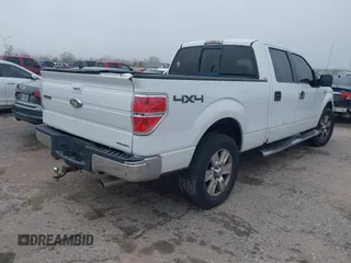 2009 Ford F-150 XL with VIN 1FTPW14V89FB30515, listed as a IAAI auction lot 41210636 with 220,187 mi miles. Bid and sale history available at carsss.com. Image 4.