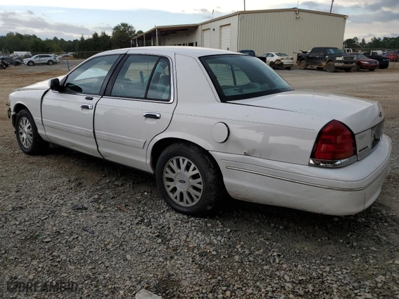 2003 Ford Crown Victoria LX with VIN 2FAFP74W03X158931, listed as a Copart auction lot 71588824 with 165,074 mi miles and Salvage Title. Bid and sale history available at carsss.com. Image 2.