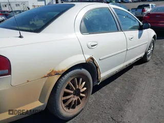 2002 Chrysler Sebring LX z VIN 1C3EL46X72N298405, wystawiony jako IAAI lot #41707487 z przebiegiem 147 576 mil mil oraz . Historia ofert i sprzedaży dostępna na DreamBid. Obrazek 6.