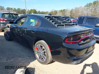 2019 Dodge Charger SXT with VIN 2C3CDXJG4KH710673, listed as a IAAI auction lot 41469797 with 102,011 mi miles and . Bid and sale history available at DreamBid. Image 3.