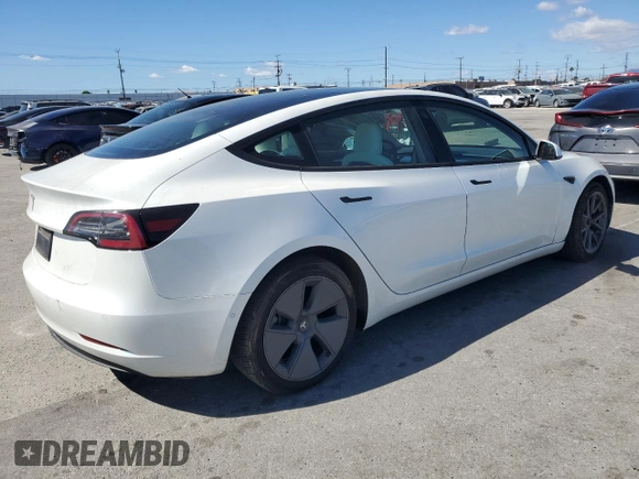 2022 Tesla Model 3 with VIN 5YJ3E1EAXNF203914, listed as a Copart auction lot 46982935 with 70,766 mi miles and Salvage Title. Bid and sale history available at DreamBid. Image 3.