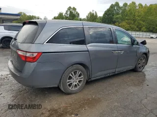 2012 Honda Odyssey EX-L with VIN 5FNRL5H64CB035196, listed as a Copart auction lot 71566704 with 243,529 mi miles and Salvage Title. Bid and sale history available at carsss.com. Image 3.