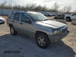 2002 Jeep Grand Cherokee with VIN 1J4GX38S82C178199, listed as a Copart auction lot 48996515 with 299,780 mi miles and Salvage title. Bid and sale history available at DreamBid. Image 4.
