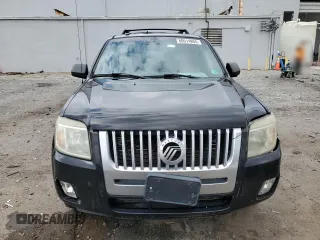 2008 Mercury Mariner z VIN 4M2CU81118KJ29141, wystawiony jako Copart lot #60014865 z przebiegiem 135 905 mil mil oraz Szkoda całkowita • Salvage title. Historia ofert i sprzedaży dostępna na DreamBid. Obrazek 5.