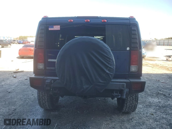 2007 Hummer H2 SUV z VIN 5GRGN23U07H104802, wystawiony jako Copart lot #41957875 z przebiegiem 161 755 mil mil oraz Szkoda całkowita • Salvage title. Historia ofert i sprzedaży dostępna na DreamBid. Obrazek 6.