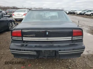 1996 Oldsmobile Cutlass Supreme S z VIN 1G3WH52M5TF374900, wystawiony jako Copart lot #86363644 z przebiegiem 160 137 mil mil oraz Szkody całkowita. Historia ofert i sprzedaży dostępna na DreamBid. Obrazek 6.