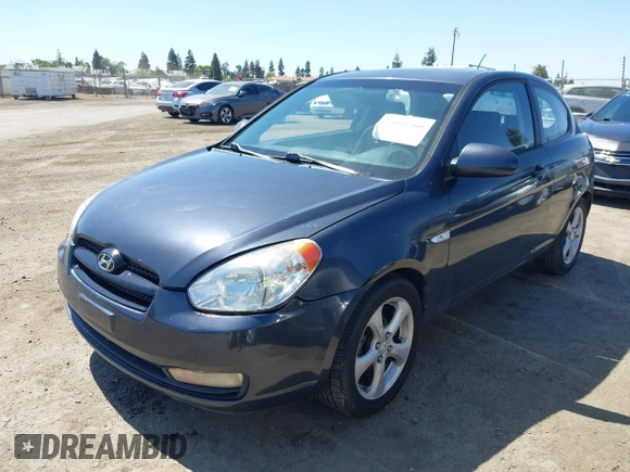 2007 Hyundai Accent SE with VIN KMHCN36C37U031369, listed as a IAAI auction lot 42093760 with 95,919 mi miles. Bid and sale history available at carsss.com. Image 17.