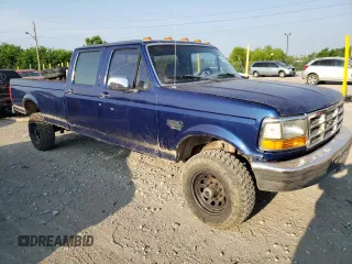 1997 Ford F-350 with VIN 1FTJW36F0VEC59307, listed as a Copart auction lot 62430515 with 199,894 mi miles and Salvage title. Bid and sale history available at DreamBid. Image 4.