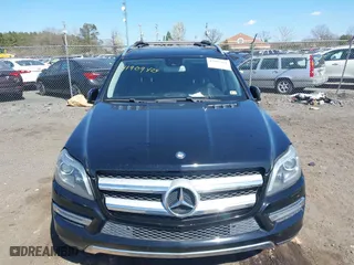 2014 Mercedes-Benz GL-Class GL 450 with VIN 4JGDF7CEXEA277610, listed as a IAAI auction lot 41909424 with 164,437 mi miles. Bid and sale history available at carsss.com. Image 12.