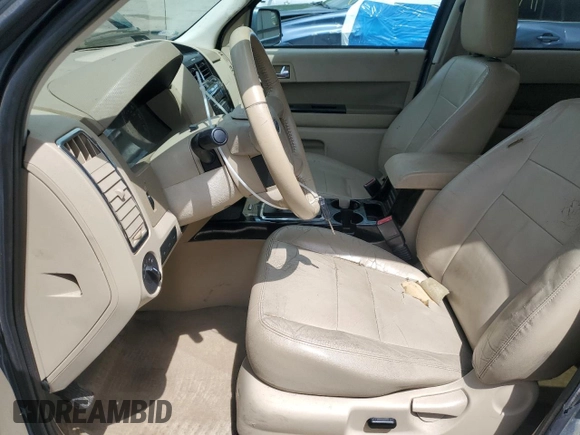 2012 Ford Escape Limited z VIN 1FMCU0EG9CKA20453, wystawiony jako Copart lot #56009755 z przebiegiem 190 000 mil mil oraz Szkoda całkowita • Salvage title. Historia ofert i sprzedaży dostępna na DreamBid. Obrazek 7.