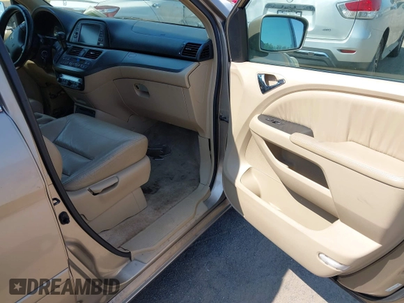 2005 Honda Odyssey EX-L with VIN 5FNRL38755B107829, listed as a IAAI auction lot 42422225 with 227,008 mi miles and . Bid and sale history available at DreamBid. Image 5.