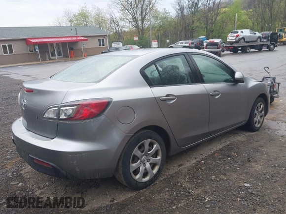 2011 Mazda Mazda3 i Sport with VIN JM1BL1UG0B1401901, listed as a IAAI auction lot 42058681 with 147,060 mi miles. Bid and sale history available at carsss.com. Image 4.