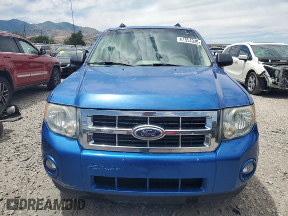 2012 Ford Escape XLT z VIN 1FMCU9DG4CKB11880, wystawiony jako Copart lot #61554935 z przebiegiem 139 385 mil mil oraz Szkoda całkowita • Salvage title. Historia ofert i sprzedaży dostępna na DreamBid. Obrazek 5.