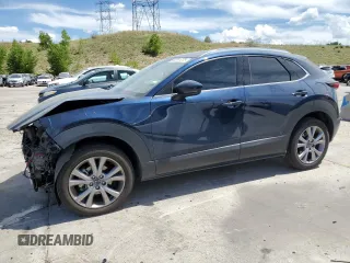 2022 Mazda CX-30 S Premium with VIN 3MVDMBDL9NM446527, listed as a Copart auction lot 63291275 with 17,035 mi miles and Salvage title. Bid and sale history available at DreamBid. Image 1.