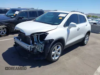 2015 Chevrolet Trax LTZ with VIN KL7CJTSBXFB236823, listed as a IAAI auction lot 42045817 with 138,930 mi miles. Bid and sale history available at carsss.com. Image 2.