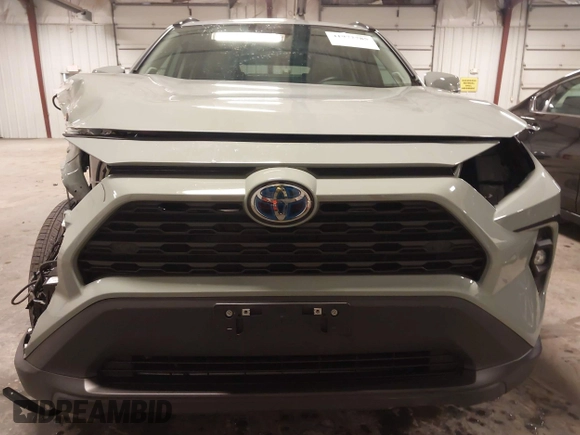 2023 Toyota RAV4 Hybrid XLE Premium z VIN 4T3B6RFV0PU118506, wystawiony jako IAAI lot #41972785 z przebiegiem 16 496 mil mil oraz . Historia ofert i sprzedaży dostępna na DreamBid. Obrazek 13.
