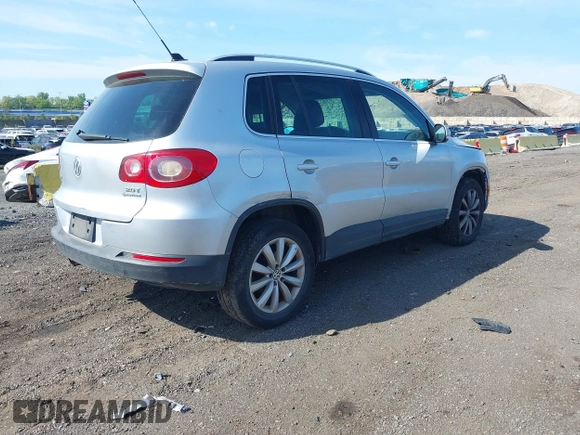 2011 Volkswagen Tiguan SE with VIN WVGBV7AX4BW528845, listed as a IAAI auction lot 42248245 with 224,808 mi miles and . Bid and sale history available at DreamBid. Image 4.