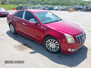 2012 Cadillac CTS Performance z VIN 1G6DJ5E31C0107905, wystawiony jako IAAI lot #42131940 z przebiegiem 108 015 mil mil oraz . Historia ofert i sprzedaży dostępna na DreamBid. Obrazek 1.