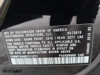2013 Volkswagen Passat SE with VIN 1VWBP7A34DC111271, listed as a IAAI auction lot 41713195 with 91,280 mi miles. Bid and sale history available at carsss.com. Image 9.