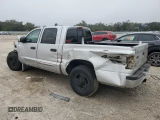 2005 Dodge Dakota Laramie with VIN 1D7HW58N75S100449, listed as a Copart auction lot 86336834 with Not Provided miles and Salvage Title. Bid and sale history available at DreamBid. Image 2.