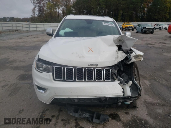 2021 Jeep Grand Cherokee Limited with VIN 1C4RJEBG1MC571318, listed as a Copart auction lot 80360894 with 66,976 mi miles and Salvage title. Bid and sale history available at DreamBid. Image 5.