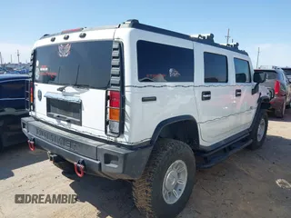 2003 Hummer H2 z VIN 5GRGN23U13H132778, wystawiony jako IAAI lot #41985070 z przebiegiem Nie podano mil oraz . Historia ofert i sprzedaży dostępna na DreamBid. Obrazek 4.