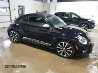 2012 Volkswagen Beetle 2.0T Turbo w/Sun/Snd/Nav PZEV with VIN 3VWVA7AT9CM604665, listed as a Copart auction lot 51984735 with 111,938 mi miles and Clean Title. Bid and sale history available at carsss.com. Image 5.