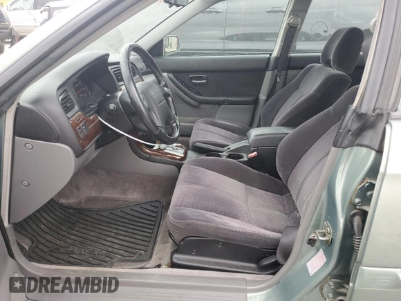2003 Subaru Legacy L with VIN 4S3BE635337208521, listed as a Copart auction lot 47694355 with 152,440 mi miles and Salvage title. Bid and sale history available at DreamBid. Image 7.