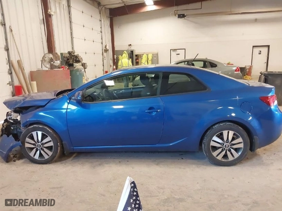 2013 Kia Forte Koup EX with VIN KNAFU6A29D5656754, listed as a IAAI auction lot 41067933 with NaN miles. Bid and sale history available at carsss.com. Image 14.