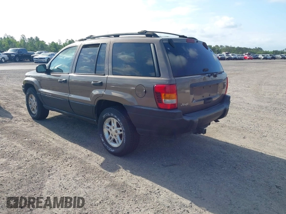 2001 Jeep Grand Cherokee Laredo with VIN 1J4GX48S91C559693, listed as a IAAI auction lot 42152103 with 152,713 mi miles and . Bid and sale history available at DreamBid. Image 3.