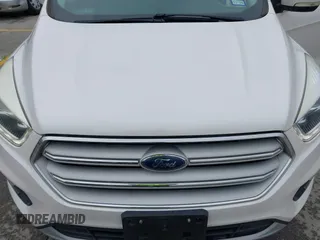 2018 Ford Escape Titanium with VIN 1FMCU9J98JUB87867, listed as a IAAI auction lot 42300123 with 48,357 mi miles and . Bid and sale history available at DreamBid. Image 6.