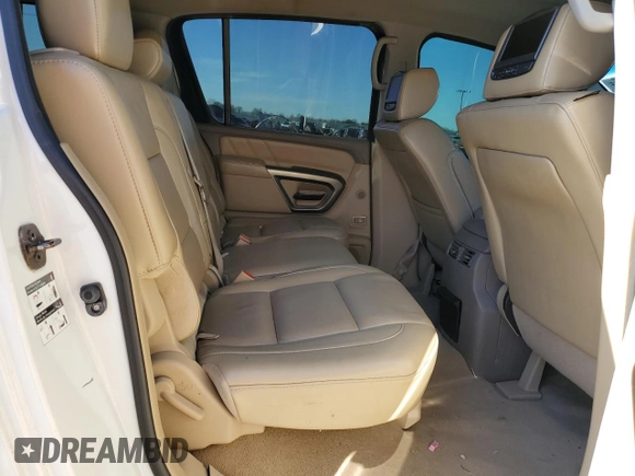 2015 Nissan Armada SV z VIN 5N1BA0ND8FN616053, wystawiony jako Copart lot #88253385 z przebiegiem 211 004 mil mil oraz Szkoda całkowita • Salvage title. Historia ofert i sprzedaży dostępna na DreamBid. Obrazek 11.