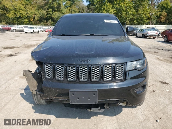 2018 Jeep Grand Cherokee Laredo E with VIN 1C4RJFAG9JC390597, listed as a Copart auction lot 71450474 with 69,645 mi miles and Salvage title. Bid and sale history available at DreamBid. Image 5.