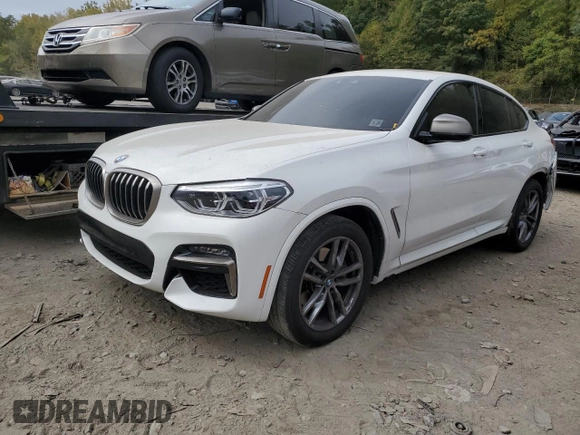2020 BMW X4 M40i z VIN 5UX2V5C04L9C56582, wystawiony jako Copart lot #72743394 z przebiegiem 44 351 mil mil oraz Nie do naprawy • Non repairable. Historia ofert i sprzedaży dostępna na DreamBid. Obrazek 1.