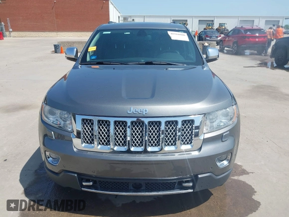 2013 Jeep Grand Cherokee Overland with VIN 1C4RJFCG2DC611877, listed as a IAAI auction lot 41910800 with 151,457 mi miles. Bid and sale history available at carsss.com. Image 12.