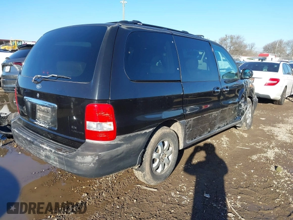 2004 Kia Sedona LX with VIN KNDUP131X46601278, listed as a IAAI auction lot 41472321 with 202,212 mi miles. Bid and sale history available at carsss.com. Image 4.