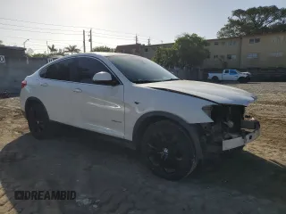 2015 BMW X4 xDrive28i with VIN 5UXXW3C5XF0F88859, listed as a Copart auction lot 41498794 with 118,684 mi miles. Bid and sale history available at carsss.com. Image 4.