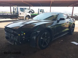 2022 Ford Mustang EcoBoost with VIN 1FA6P8TH9N5109501, listed as a IAAI auction lot 42437964 with 56,895 mi miles and . Bid and sale history available at DreamBid. Image 2.