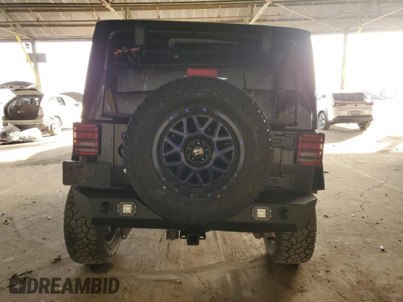 2017 Jeep Wrangler Unlimited Rubicon Recon with VIN 1C4HJWFG5HL508658, listed as a Copart auction lot 87092924 with 108,574 mi miles and Salvage title. Bid and sale history available at DreamBid. Image 6.