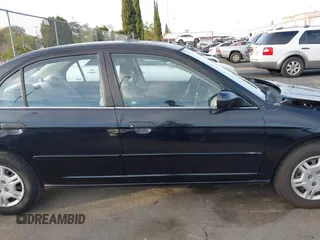 2001 Honda Civic LX with VIN 2HGES16501H619916, listed as a IAAI auction lot 41599951 with 230,395 mi miles. Bid and sale history available at carsss.com. Image 13.