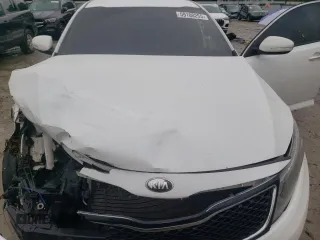2014 Kia Optima LX with VIN KNAGM4A70E5494065, listed as a Copart auction lot 59100255 with 126,983 mi miles and Salvage title. Bid and sale history available at DreamBid. Image 11.