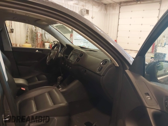 2012 Volkswagen Tiguan SE with VIN WVGBV7AX6CW093750, listed as a IAAI auction lot 42329775 with 117,509 mi miles and . Bid and sale history available at DreamBid. Image 5.