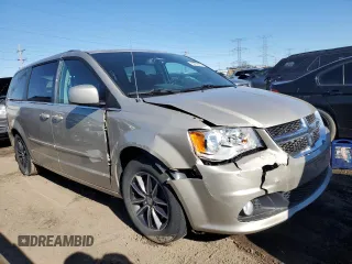 2016 Dodge Grand Caravan SXT with VIN 2C4RDGCG5GR219517, listed as a Copart auction lot 50052405 with 104,552 mi miles and Salvage Title. Bid and sale history available at DreamBid. Image 4.