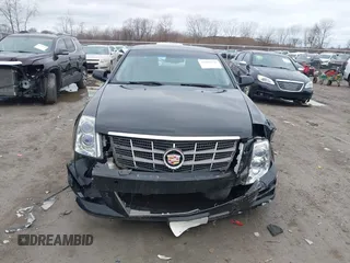 2009 Cadillac STS AWD z VIN 1G6DD67V290140111, wystawiony jako IAAI lot #41800236 z przebiegiem 81 913 mil mil oraz . Historia ofert i sprzedaży dostępna na DreamBid. Obrazek 11.