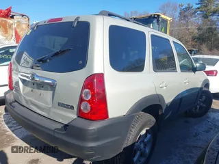 2006 Mazda Tribute i with VIN 4F2YZ92Z66KM10050, listed as a IAAI auction lot 41346153 with 139,668 mi miles and . Bid and sale history available at carsss.com. Image 4.