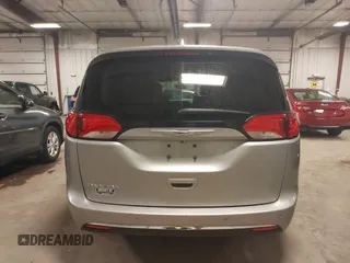 2018 Chrysler Pacifica Touring L with VIN 2C4RC1BG3JR330401, listed as a IAAI auction lot 41250303 with 86,975 mi miles and . Bid and sale history available at DreamBid. Image 17.