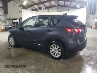 2014 Mazda CX-5 Touring with VIN JM3KE4CY8E0335573, listed as a Copart auction lot 46471085 with 80,041 mi miles and Salvage Title. Bid and sale history available at carsss.com. Image 2.