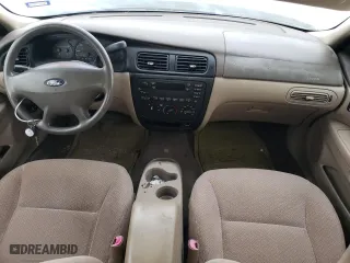 2001 Ford Taurus LX with VIN 1FAFP52U51A145880, listed as a Copart auction lot 77084934 with 54,143 mi miles and Salvage Title. Bid and sale history available at carsss.com. Image 8.