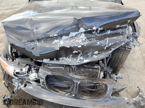 2011 BMW 1 Series 135i with VIN WBAUN7C50BVM24185, listed as a Copart auction lot 79507574 with Not provided miles and Salvage title. Bid and sale history available at DreamBid. Image 12.
